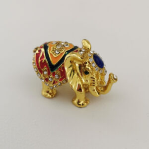 Toute petite boite en forme d'éléphant doré et coloré