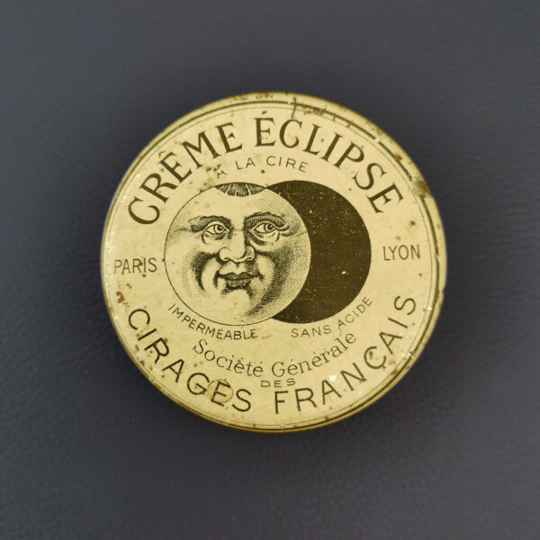 Boîte ancienne en métal Crème Éclipse avec lune souriante – publicité vintage française
